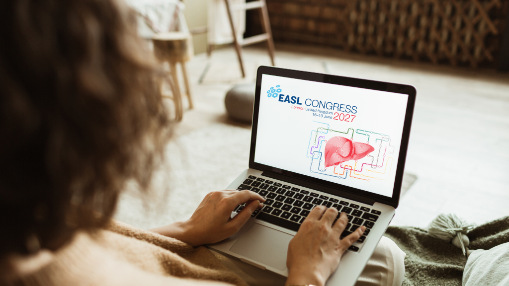 A person following EASL Congress on a laptop at home