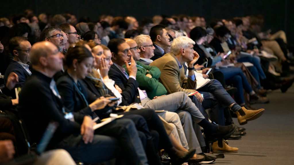 Delegates seated in a full EASL Congress session hall